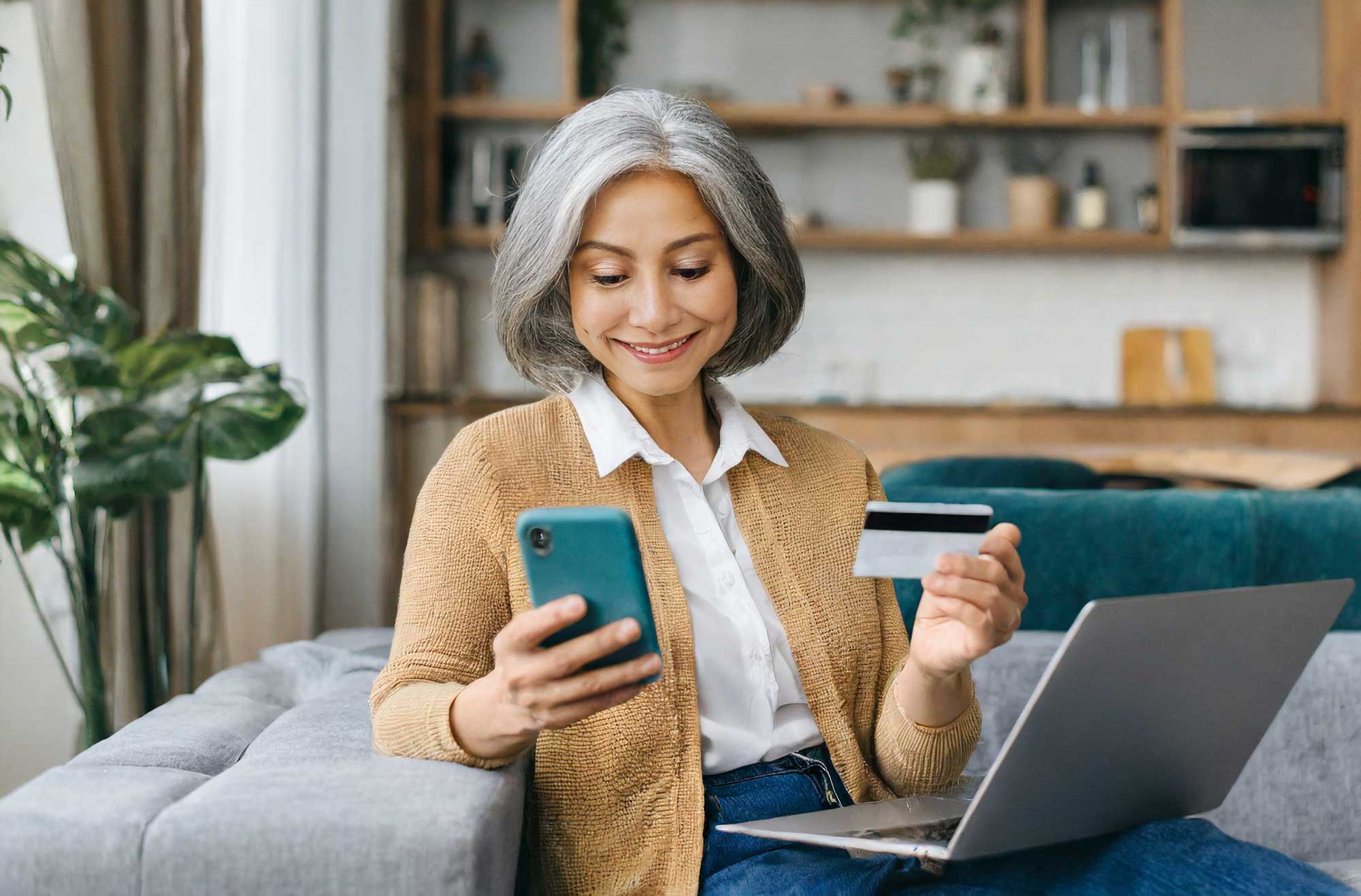 serene-middle-aged-grey-haired-asian-woman-at-home